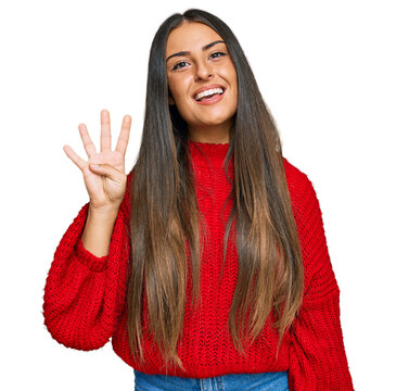 Beautiful hispanic woman wearing casual clothes showing and pointing up with fingers number four while smiling confident and happy.