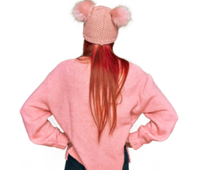 Young caucasian woman wearing casual clothes and wool cap standing backwards looking away with arms on body