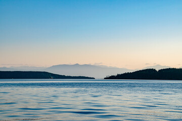 Mountains Silhouetted Along the Strait of Georgia in Vancouver Island, British Columbia, Canada