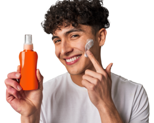 A young man protects his skin from harmful UV rays, applying non-greasy, broad-spectrum sunscreen for a healthy and youthful look.