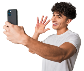 Capturing a smile: Young man taking a selfie.