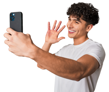 Capturing a smile: Young man taking a selfie.