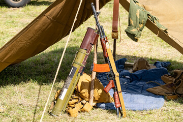 Soviet military camp with Kalashnikov assault rifle and RPG-22 Anti-Tank rocket launcher