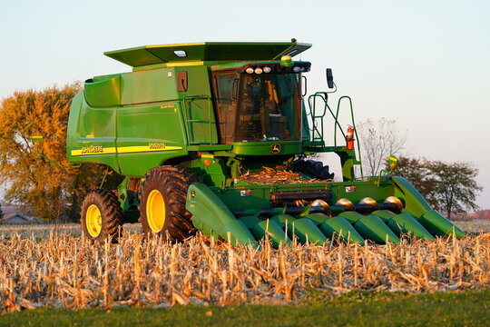 John deere x9 1000 combine harvester sits on farmland during the Autumn season. 