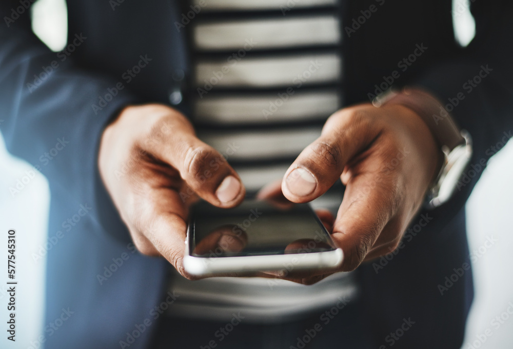 Poster Reach out and make new connections. Closeup shot of an unrecognizable businessman using a cellphone in an office.