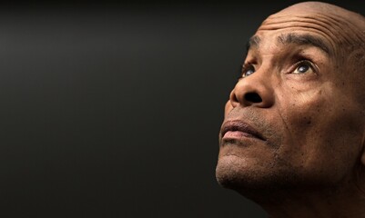 people praying to god at home on black background with people stock photo