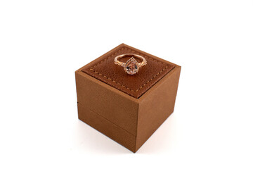 Rose gold pear shaped engagement ring with box for proposal