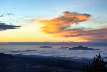 mountains at sunrise on a cloudy day