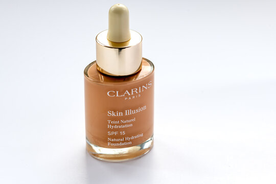 London. UK- 03.01.2023. A bottle of Skin Illusion cosmetic make up by Clarins isolated in white.