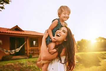 Its an awesome day when we remember to play. Cropped shot of a young family spending time together...