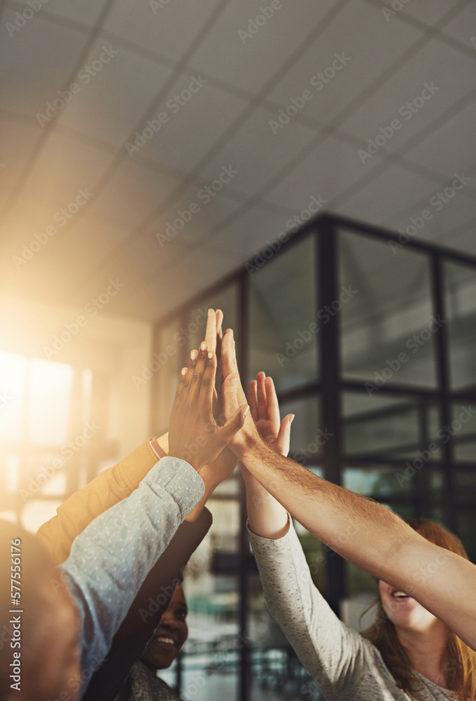 Poster Touch times dont last but touch teams do. Shot of a group of colleagues giving each other a high five.