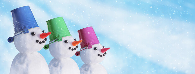 Christmas winter banner - view of a family of snowmen on a background of snow in a winter forest. Holiday background with copy space for text