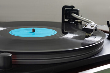 Fototapeta na wymiar Record player, vinyl turntable record player, while playing the record.