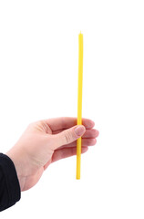 Woman holding church candle on white background, closeup