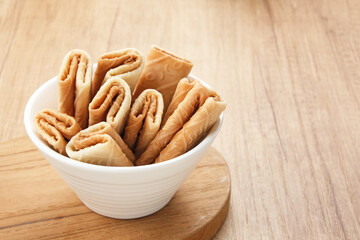 Kue Lempit or Kue Kapit, Indonesian traditional snack, crunchy and sweet
