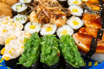 angle view various sushi closeup