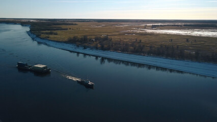 River tow pusher with barge. Clip. Top view of barge floating with cargo on river. River barge...