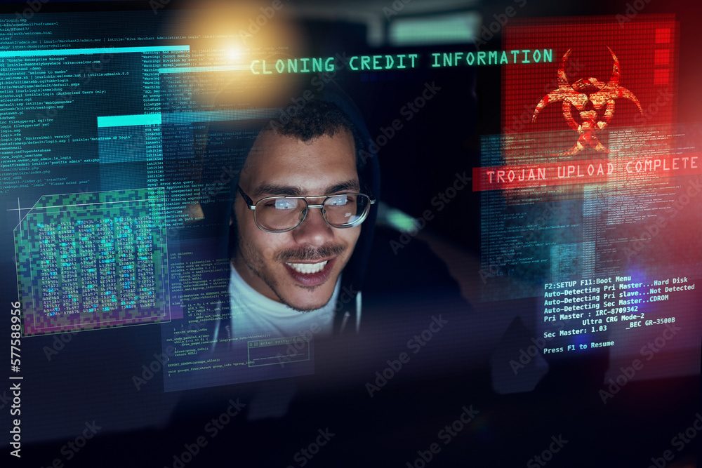 Poster Its time to attack. Shot of a young hacker cracking a computer code in the dark.