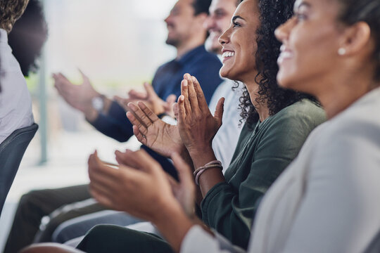 Acknowledging a colleagues achievement. Cropped shot of a group of businesspeople applauding during a seminar in the conference room.