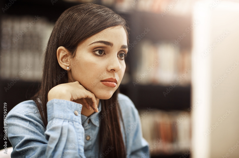 Aufkleber focused on her bright and successful future. shot of a university student working on a computer in t