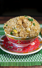 special chaufa rice with pork and beef, sautéed in a hot wok.
