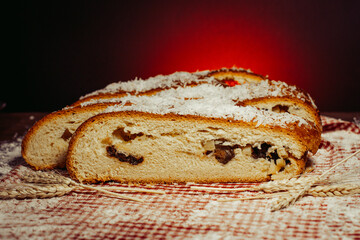 bread in the foreground on picnic blanket