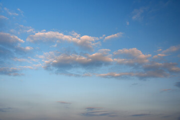 Sunrise sky with light clouds
