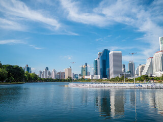Benjakitti Park with a cityscape in Bangkok, Thailand.