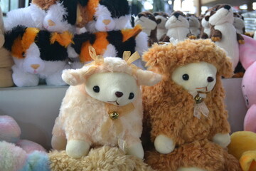Two sheep dolls.