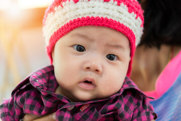 close up of cute asia baby, asia baby boy, happy baby at home