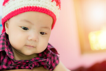 close up of cute asia baby, asia baby boy, happy baby at home