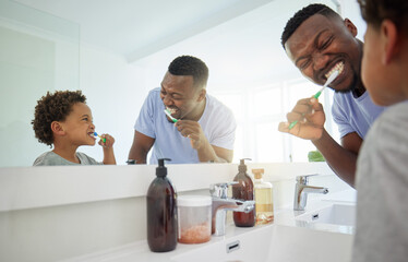 Dental hygiene, father and son brushing teeth, morning routine and wellness in bathroom with smile....