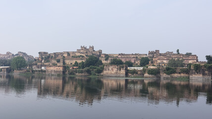 Fototapeta na wymiar The Beautiful Reflection of Baldeogarh Fort Palace in the Lake, Baldevgarh, Madhya Pradesh, India.