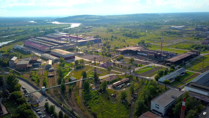 Industrial factory production area. Clip. Aerial view of an industrial zone on a summer day, aerial view.