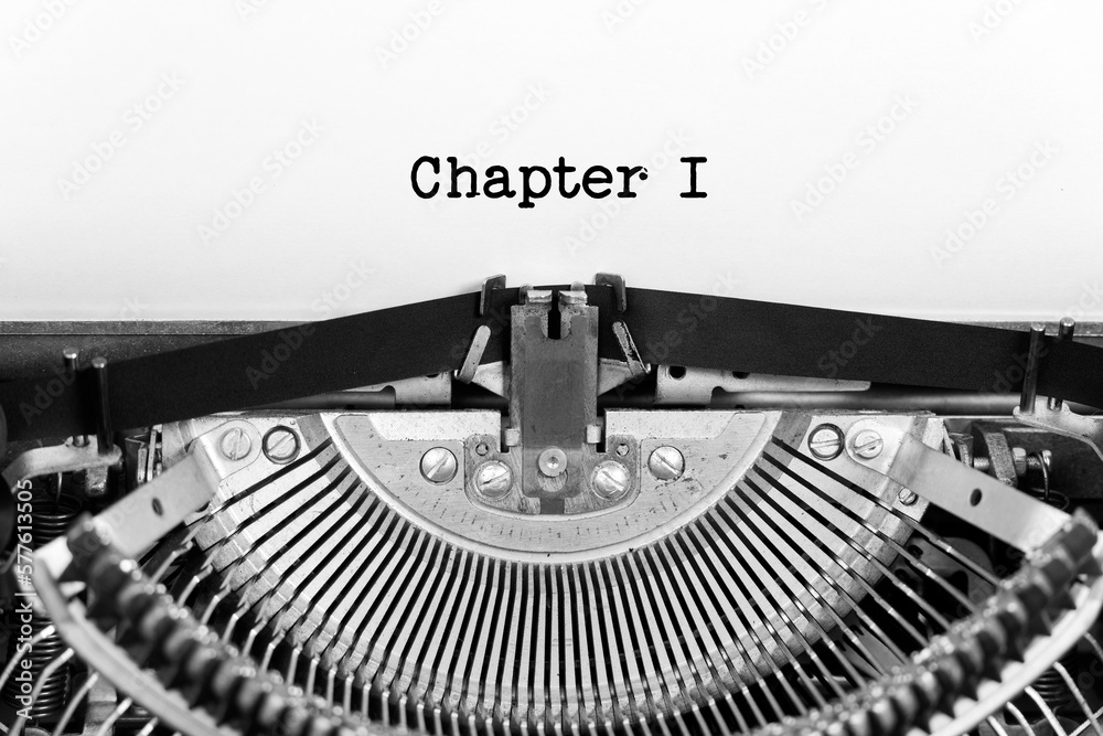 Fototapete chapter one phrase closeup being typing and centered on a sheet of paper on old vintage typewriter m