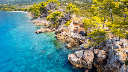 Fototapeta na wymiar Take in the breathtaking aerial view of Makarska Riviera in Croatia, revealing a picturesque rocky beach and the vibrant turquoise water.