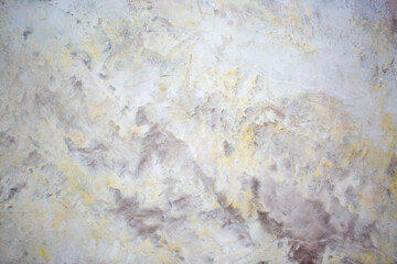 Background Stone wall background with abstract spots. Beautiful gray marble texture with stains, abstract surface background. Finishing stone for building cladding. Furniture granite.