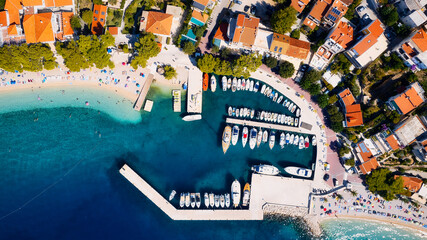 Take in the breathtaking view of Croatia's ports and marinas from above, showcasing luxurious...
