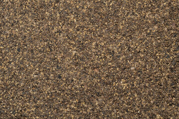 Poured ground black pepper background. Dry seasoning pepper. Spices and herbs for cooking, pepper powder