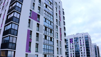 Fototapeta premium Aerial view of the cityscape with residential complex. Stock footage. New city district with many high rise buildings.