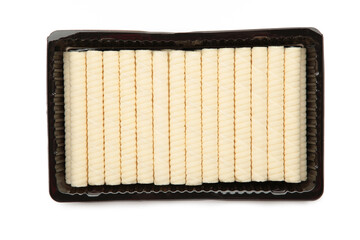 Crispy wafer rolls in a package. Wafer rolls isolated on a white background. Crispy dessert isolated.
