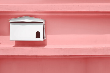 steel mailbox letter, home interior, red pink concrete cement brick wall ,  soft grunge texture background
