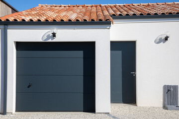 sectional car entrance facade home garage grey of modern new building house in suburb street view