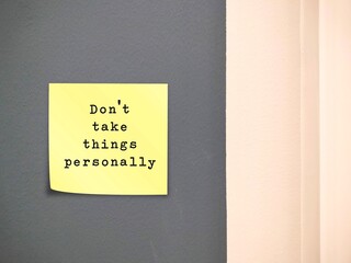 Stick note on wall with text written - Don't Take Things Personally - stop being upset thinking others are criticizing you in particular, convinced that another person comments are about you - obrazy, fototapety, plakaty