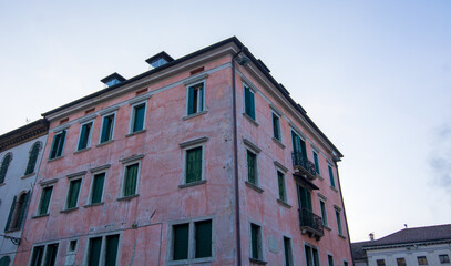 an Ancient Pink Palazzo in the center of Belluno, the small city of Venetian origin