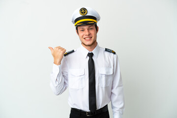 Airplane Russian pilot isolated on white background pointing to the side to present a product