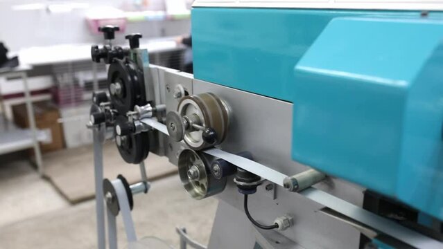 Machine for making metal blinds. Factory