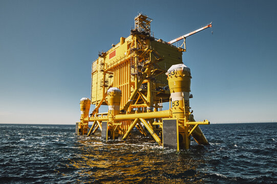 Process of installation, building offshore electrical wind power plant station in the sea.