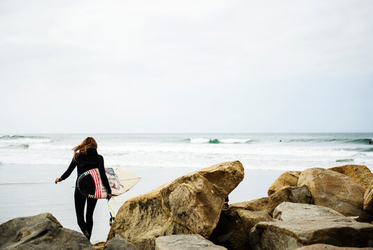 Walking out for one more wave