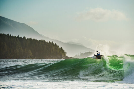 Surfer turns on a frigid canadian wave